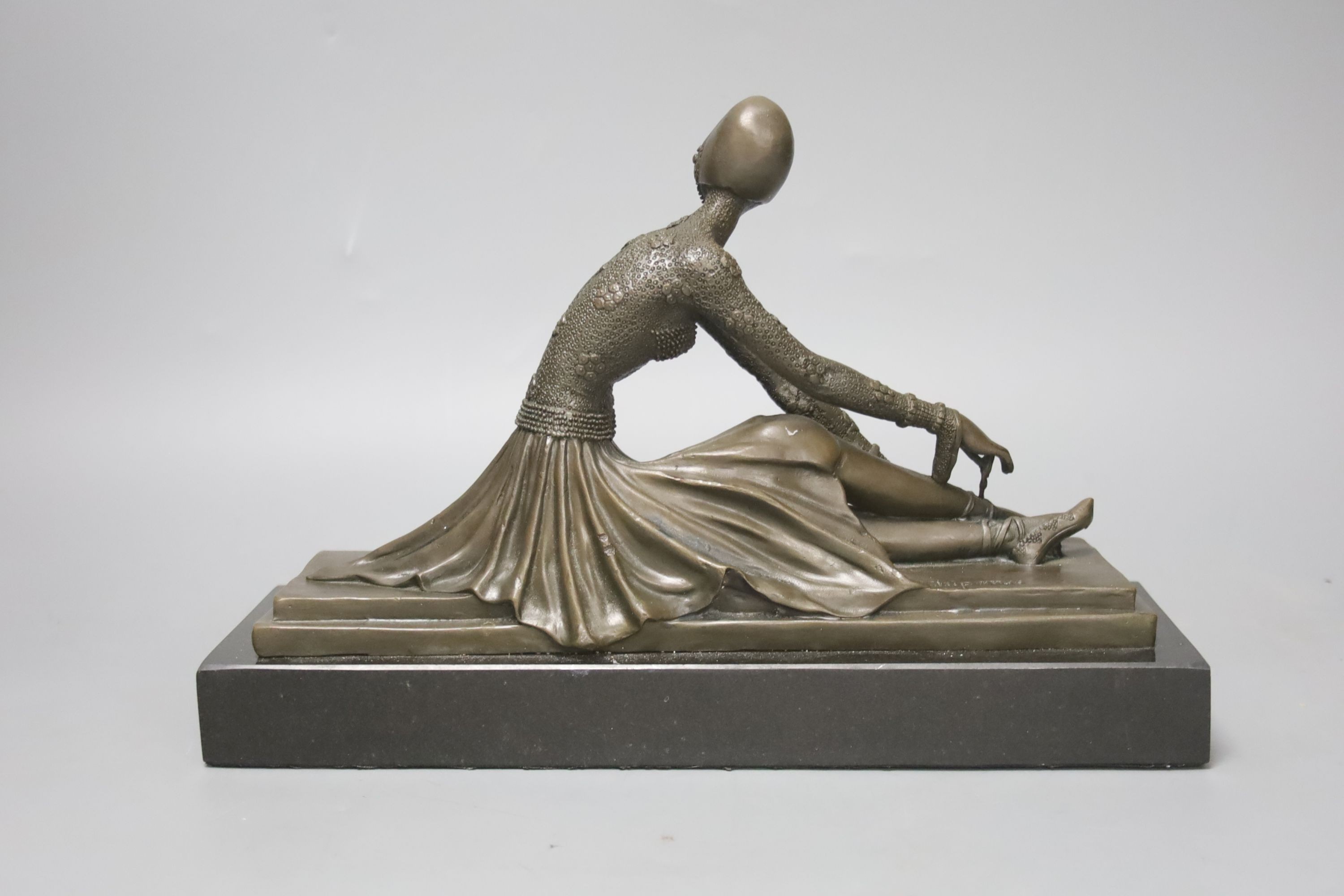 Bronze statue, after Demetre Chiparus of a seated ballerina; 29cm L x 19cm H x 10cm W